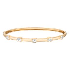 Our Multi Bangle is a true staple for any jewelry collection. It's chic and modern with it's play on the various shaped gemstones. It also adds the perfect pop of color to your wristgame. Be warned, they're addictive! 14k yellow gold and diamonds Diamond weight approximately 1.30ct Length 7 inch (oval shaped) Bangle width 3.25mm Hidden closure with side push clasp Please allow 6-8 weeks for production if not in stockCustom lengths available upon request. Email us IN STOCK ✅ Modern Baguette Cut Diamond Bracelet, Modern Diamond Bracelet With Bezel Setting, Luxury 14k Gold Diamond Bracelet With Gemstones, Modern 14k Gold Bangle With Diamond Accents, Modern 14k Gold Bangle With Single Cut Diamonds, Modern Yellow Gold Bangle With Single Cut Diamonds, Modern Yellow Gold Bracelets With Bezel Setting, Gold Diamond Bracelet With Bezel Setting, Modern Diamond Bangle With Baguette Cut