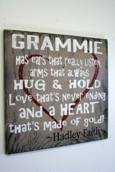 a wooden sign with words on it that says, grammie has ears that really listenen arms that always hug & hold love that's never ending and a heart that's made of gold