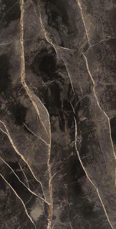 a black and gold marble textured wallpaper