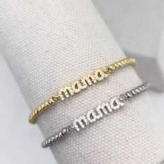 Wear your MAMA status in style with our gorgeous MAMA Pave Bracelet. So fun to layer this sparkly piece with other bracelets from your collection, wear it stacked and make it fun! This adjustable slider style bracelet fits all wrist sizes and stays in place all day. Gold or silver plated. This piece is ready to ship and usually leaves our studio in 1 to 3 business days. BACK TO MY SHOP: https://www.etsy.com/shop/IsabelleGraceJewelry Adjustable Crystal Bracelet For Anniversary On Mother's Day, Adjustable Beaded Meaningful Bracelets, Adjustable Silver Crystal Bracelet For Mother's Day, Trendy Name Bracelet For Mother's Day, Mother's Day Letter Beads Bracelet Jewelry, Adjustable Beaded Bracelets As Gift For Mom, Adjustable Bangle Jewelry Gift For Mom, Adjustable Beaded Bracelets For Anniversary On Mother's Day, Adjustable Stackable Stretch Bracelet For Mother's Day