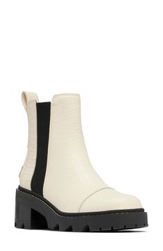 An essential Chelsea boot with a sleek, waterproof leather upper and lug sole can easily be styled up or down to match your mood. Waterproof: protects against rain, puddles and slush to keep feet dry in wet conditions 2 1/4" heel; 3/4" platform (size 8.5) 5 3/4" shaft Pull-on style with elastic gore insets Removable insole Leather and textile upper/textile and synthetic lining/rubber sole Imported Trendy Moto Boots With Lug Sole For Outdoor, White Insulated Leather Boots, Insulated White Leather Boots, White Leather Weatherproof Boots, Trendy Leather Boots For Outdoor, Casual Leather Rain Boots For Fall, White Insulated Fall Boots, Leather Ankle Rain Boots With Lug Sole, Insulated Leather Workwear Boots