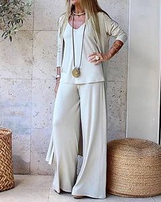 Material: 85%Polyester. 15%Spandex Detail: Pullovers Occasion: Leisure. Daily Style: Vacation Reference Size Chart Tops Size Chart SIZE US Length Bust Cardigan Inch CM Inch CM Inch CM S 4 23.2 59 37 94 46.1 117 M 6 23.6 60 38.6 98 46.5 118 L 8-10 24 61 40.2 102 46.9 119 XL 12 24.4 62 41.7 106 47.2 120 2XL 14 24.8 63 43.3 110 47.6 121 3XL 16 25.2 64 44.9 114 48 122 Bottoms Size Chart SIZE US Length Waist Hip Inch CM Inch CM Inch CM S 4 39.4 100 25.2 64 39.4 100 M 6 39.8 101 26.8 68 40.9 104 L 8-10 40.2 102 28.3 72 42.5 108 XL 12 40.6 103 29.9 76 44.1 112 2XL 14 40.9 104 31.5 80 45.7 116 3XL 16 41.3 105 33.1 84 47.2 120 Comfort Home, Long Cardigan Coat, Womens Loungewear Sets, Women's Loungewear, Sweatsuit Set, Soft Pajamas, Casual Cardigans, Color Fashion, Loungewear Sets