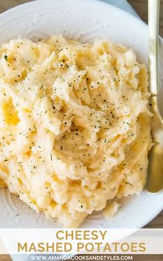 mashed potatoes in a white bowl with a spoon