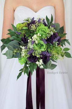 a bridal holding a purple and green bouquet