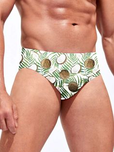 Escape to paradise with our Tropical Print Swim Brief. Embodying the spirit of a tropical getaway, this swim brief features a vibrant and exotic print that transports you to sun-soaked beaches and palm-fringed shores. Made from high-quality, quick-drying fabric, it offers a comfortable and flexible fit for all-day wear. Features: Pattern Type: Fruit & Vegetable Type: Briefs Fabric: Medium Stretch Material: Fabric Care Instructions: Hand wash or professionally dry clean Size Chart ( Inches ): Siz Palm Tree Print Swimwear For Pool And Beach Season, Beachwear Swim Trunks With Tropical Print For Vacation, Tropical Swim Trunks For Beach Season, Palm Tree Print Swimwear For Beach Season, White Brief Swim Trunks For Beach, Surfing Swim Trunks For Beach Season, Tropical Print Swim Trunks For Beach, Beachwear Swimwear With Palm Tree Print For Beach Season, Beachwear Swimwear With Palm Tree Print For Pool