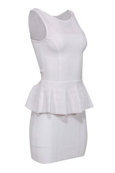 Get some white hot style with this slinky bandage dress from Milly! Made with a flattering peplum silhouette, this is a curve-hugging cocktail frock that will cinch in your waist and add some elegance to any pair of pumps! Swipe on a red lipstick for a final sultry touch. Size P 72% Viscose, 28% Polyester Bodycon silhouette Peplum waist Illusion neckline Woven crochet details Material provides stretch Back zipper closure Waist 21" Bust 24" Total length 35" White Stretch Bodycon Dress With Ruffles, White Sleeveless Stretch Bandage Dress, Fitted Peplum Mini Dress For Spring, White Stretch Bandage Bodycon Dress, White Stretch Bandage Dress For Spring, White Stretch Bandage Mini Dress, Fitted Peplum Mini Dress For Party, White Mini Length Stretch Bandage Dress, White Stretch Bandage Dress Mini Length