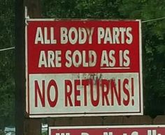 a red and white sign that says all body parts are sold as is no returns