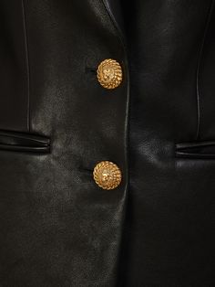 Find BALMAIN Fitted Leather Jacket on Editorialist. Front button closure. Button cuffs. Center back vent. One breast pocket. Two front pockets. One internal pocket. Lined. Model is wearing a size36 Luxury Leather Blazer With Snap Buttons, Luxury Business Leather Jacket With Buttons, Luxury Leather Jacket With Buttons For Business, Luxury Blazer With Snap Buttons For Fall, Designer Formal Leather Jacket With Snap Buttons, Luxury Leather Jacket With Lapel Collar And Button Closure, Luxury Leather Jacket With Button Cuffs, Designer Leather Jacket With Snap Buttons For Formal Occasions, Designer Business Blazer With Snap Buttons