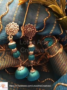 Raw electric blue and silver silk thread jewellery with mini jhumka and stud. Perfect choice for any Indian ethnic wear. Call or whatsapp +919840009398 to place your order. International and domestic orders accepted. https://m.facebook.com/LotusArtsCreatives/ Mini Jhumka, Silk Thread Earrings Designs, Thread Crafts, Jewellery Board, Jewellery Diy, Quilling Earrings