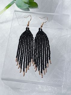 Classic Black Earrings with Rose Gold Accents. Not too long and not too short, just right for day or night wear. Party Black Fringe Earrings, Black Beaded Fringe Earrings For Party, Chic Black Fringe Earrings, Black Beaded Fringe Dangle Tassel Earrings, Black And Gold Beaded Fringe Earrings, Seed Bead Fringe Earrings, Bead Fringe Earrings, Black And Rose Gold, Bead Fringe