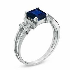 Emerald-Cut Blue Sapphire and 1/10 CT. T.W. Diamond Engagement Ring in 14K White Gold | Engagement Rings | Wedding | Zales White Gold Asscher Cut Birthstone Ring For Formal Occasions, Formal 14k White Gold Sapphire Ring With Princess Cut, Elegant Asscher Cut Birthstone Ring For Formal Occasions, Formal Sapphire Princess Cut Diamond Ring, Elegant Platinum Sapphire Ring Channel Set, Formal 14k White Gold Ring With Asscher Cut, Formal 14k White Gold Channel Set Ring, Formal Sapphire Princess Cut Rings, Elegant Sapphire Diamond Ring Channel Set