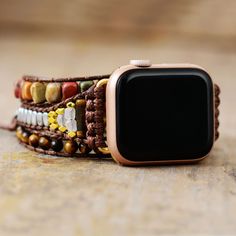 Showcase your style with this luxurious Boho Multilayer Wraps IWatch Strap, made with premium tiger eye, jasper and crystal beads. Its brown tones exude elegance and sophistication, making it the perfect accessory for your sophisticated look. Material: Jasper, Metal Beads, Crystal, Tiger Eye. 3 sizes: The length of watchband have 3 sizes: S-48cm/M-53cm/L-56cm. Fit for: Apple Watch series 8 7 6 5 4 3 2 SE. Band fits 5.3-7 inches wrist, compatible with 38mm-45mm apple watch face, easy to install, Handmade Watch Bands, Apple Watch Series 8, Apple Watch Face, Band Fits, Apple Watch Faces, Energy Stones, Brown Tones, Apple Watch Strap, Jasper Gemstone