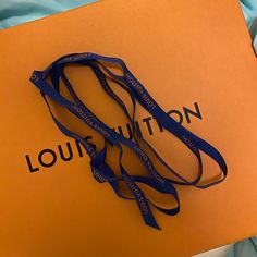 Selling The Signature Louis Vuitton Ribbon Only. It’s Super Long Since I Purchased A Large Purse And They Use This Ribbon To Tie Up The Box. No Flaws, Looks Brand New Louis Vuitton Blue, Large Purse, Ribbon Colors, The Box, Color Blue, Louis Vuitton, Ribbon, Purse, Brand New