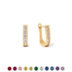 These 14K Gold huggies feature tiny colored gemstones. Great Birthstone gift! 14K Gold Colored crystal stones Hypoallergenic. Lead and nickel free Thickness 2mm Inside diameter 7mm Click lock closure #ES150-G Birthstones By Month, Gold Huggies, Colored Gemstones, Gold Stud Earrings, Birthstone Gifts, Crystal Stones, Fine Jewelry Collection, Gold Stud, Tragus