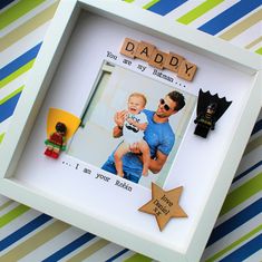 a father's day photo frame with his son and two little stars on it