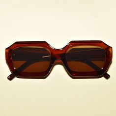 "These 1960's vintage inspired sunglasses feature a mod retro rectangular angular design, have an squared shaped lens, provide UV400 protection. Measurements: L 5.5\" x W 1 3/4\"" Rectangular Tinted Sunglasses For Parties, Rectangular Brown Sunglasses For Party, Brown Rectangular Sunglasses For Party, Vintage Square Sunglasses With Tinted Lenses, Retro Rectangular Sunglasses With Polarized Lenses, Retro Rectangular Polarized Sunglasses, Retro Square Sunglasses With Uv Protection, Rectangular Sunglasses With Uva Protection For Party, Retro Square Sunglasses With Tinted Lenses