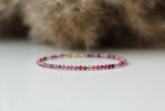 "This beautiful gemstone bracelet is made with high quality (AAA) natural Ruby crystals. Ruby is the crystal for a 40th wedding anniversary or people with a July birthday. This delicate Ruby bracelet is perfect for itself or is simple enough that it can be layered with other bracelets. This is the perfect gift for any occasion or just gift for yourself - we worth it;) . ❗️Sign up to our Newsletter and get 15% OFF your order (copy this link to browser search) - https://forms.gle/R74xLdL1MSmC9Apn6 Spiritual Round Beaded Bracelets For Anniversary, Wedding Gemstone Bracelets With Round Beads, Wedding Gemstone Bracelets With Beads, Wedding Gemstone Beaded Bracelets, Anniversary Jewelry With Round Birthstone Beads, Adjustable Gemstone Beaded Bracelets For Anniversary, Dainty Beaded Bracelets For Anniversary, Rondelle Gemstone Beads Jewelry For Anniversary, Minimalist Beaded Bracelets With Round Beads For Anniversary