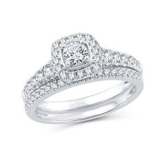 Ring Style: Bridal Sets, Engagement Rings, Single Center Rings# Pieces In Set: 2Diamond Clarity: I2-I3Shape: CushionStone Cut: RoundDiamond Color: I-JMetal Color: WhiteCenter Stone Weight: 3/8 Ct.Ring Gallery Height: 6.7mmRounded Carat Weight: 1 Ct. T.w.Band Width: Care: Wipe CleanStone Type: 54 Natural DiamondAuthenticity: Natural DiamondMetal: 10k White GoldCountry of Origin: Imported Classic Bridal Set With Halo Setting For Anniversary, Anniversary Bridal Sets With Halo Round Cut, Anniversary Bridal Set With Halo Design, Diamond White Bridal Sets With Halo Design For Anniversary, White Gold Bridal Sets With Center Stone, White Gold Bridal Sets With Halo Setting, White Round Cut Bridal Sets With Halo Setting, White Bridal Sets With Round Cut Halo Setting, Classic Bridal Sets With Halo Setting In Diamond White