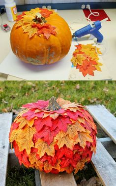 a pumpkin made out of leaves sitting on top of a wooden pallet