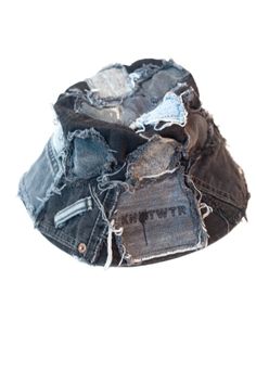 Raise your style with our Upcycled Denim Bucket Hat, a sustainable fashion accessory that blends classic denim with a distinctive patchwork twist. Crafted from upcycled denim materials, this hat is not only a striking fashion statement but also an environmentally conscious choice that supports eco-friendly practices.Its versatile design makes it the perfect addition to any outfit, whether you're dressing up for a day out or keeping it casual for a weekend getaway. The bucket hat provides excelle Denim Bucket Hat, Upcycled Denim, Environmentally Conscious, Weekend Getaway, Unique Fashion, Black Denim, Fashion Statement, Sustainable Fashion, Bucket Hat