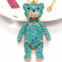 Betsey Johnson Blue Crystal Bow Tie Teddy Bear Pendant Necklace, Charm With 27" Gold Chain. Nwt, Never Worn. This Sweet Teddy Bear Pendant Is Designed To Move With His Jointed Arms & Legs, Decorated With Hues Of Blue Rhinestones, Accented And Framed In Gold. Pendant Is 27" Inch Gold Chain With A 2" Inch Extension Chain And A Lobster Clasp For A Perfect Fit & Easy Fastening. Betsey Johnson Tag And Signed Heart Are Includes: 1 Pendant, Tag, Signed Heart, Chain & Free Gift Bag. Necklace Length: 27" Light Blue Metal Necklace For Gift, Blue Necklace With Lobster Clasp For Party, Teddy Bear Pendant, Perfume Necklace, Bag Necklace, Blue Teddy Bear, Red Heart Earrings, Sweater Necklace, Halloween Necklace