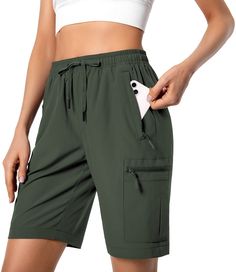 PRICES MAY VARY. Lightweight & Quick Dry Fabric: Lightweight, breathable, quick-dry and water-resistant fabric. The womens hiking shorts keep you cool and fresh all day. Adjustable Elastic Waistband: The women cargo shorts have a 360-degree elastic waist with adjustable drawstring to prevent pressure marks on the tummy and offers a custom fit during hiking or athletic. 5 Zipper Pockets: 2 Zipper side pockets, 2 zipper cargo pockets and 1 zipper rear pocket are deep enough to store your cellphone Womens Hiking, Hiking Shorts, Hiking Women, Women Cargos, Water Resistant Fabric, Athletic Shorts, Custom Fit, Cargo Shorts, Quick Dry