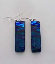 "I fused 2 layers of glass to create this gorgeous earring ,,dichroic glass and clear glass on the top. The size is 1/4\" by 1 1/4\" .All my jewelry come in a nice gift box." Unique Glass Jewelry With Matching Earrings, Handmade Iridescent Czech Glass Earrings, Iridescent Nickel-free Earrings As A Gift, Clear Glass Earrings As A Gift, Clear Glass Earrings For Gifts, Clear Glass Earrings For Gift, Iridescent Czech Glass Drop Earrings, Iridescent Czech Glass Earrings For Gift, Nickel-free Rectangular Czech Glass Jewelry