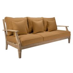 a wooden couch with four pillows on it's back and arm rests against a white background