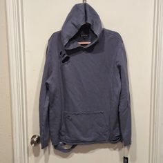 This Nwt Elwood Pullover Hoodie In Gray-Blue Color Is Perfect For Anyone Who Loves Streetwear And Grunge Fashion. Made Of High-Quality Jersey Fabric, This Hoodie Features Distressed And Destroyed Details That Give It A Unique And Edgy Look. Ideal For Men Of Size S, This Regular-Sized Hoodie Is Perfect For Casual Wear And Can Be Paired With Any Outfit. Its Pullover Style And Hood Make It Comfortable And Stylish At The Same Time. Whether You're A Skater Or Just Love The Grunge Look, This Hoodie Is Casual Ripped Winter Sweater, Casual Ripped Sweater For Winter, Distressed Blue Sweatshirt For Streetwear, Urban Distressed Hoodie For Fall, Hooded Washed Blue Sweatshirt For Fall, Winter Distressed Hooded Tops, Fall Washed Blue Hooded Sweatshirt, Blue Distressed Cotton Sweatshirt, Casual Long Sleeve Distressed Hoodie