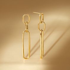 Catch your most flattering light with the Triple Link Drop Earring, designed for everyday elegance.Made from 14kt gold plated .925 sterling silverTriple Open Drop EarringPost & FrictionAL200121VMade in Italy Formal Yellow Gold Plated Linear Earrings, Classic 14k Gold Filled Earrings For Everyday Luxury, Elegant Yellow Gold Linear Earrings In Sterling Silver, Elegant Yellow Gold Sterling Silver Linear Earrings, Minimalist Gold-plated Earrings With Polished Finish, Minimalist Gold Plated Earrings With Polished Finish, Gold-tone 14k Gold Earrings As A Gift, Gold-tone 14k Gold Earrings For Anniversary, Gold Plated Linear Earrings For Formal Events