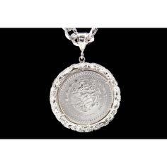 "Pure Silver Centenario 100% Silver Centenario Coin Contains .925 silver crown (Limited Amount) Centenario includes Necklace Chain is 26\" - 8mm Centenario Measures 2\" Limited Edition Centenario de Plata Puro NO IMITACION El Centenario is 100% Original Tiene corana de .925 Plata Edicion Limitada La Cadena es de 26\" y 8mm Edicion Limitada" Luxury Silver Medallion Jewelry, Sterling Silver Medallion With Diamond Cut, Silver Coin-shaped 925 Stamped Jewelry, Silver Coin Jewelry Stamped 925, Silver Coin-shaped Sterling Silver Jewelry, Silver Coin Shaped Sterling Silver Jewelry, Sterling Silver Coin Shaped Jewelry, Sterling Silver Coin Jewelry In Silver, Luxury Silver Coin Necklaces