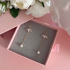 * DETAILS * - Natural Freshwater Baroque Pearls - Gold Plated CZ Paved Flower Charms 16*12mm ✨You may also like the matching necklace in the photos. Here is the link. https://www.etsy.com/JinnysJewelryBySeJin/listing/1258313379/14k-gold-filled-lariat-necklace-y-pearl?utm_source=Copy&utm_medium=ListingManager&utm_campaign=Share&utm_term=so.lmsm&share_time=1656464095232 ------------------------------------------ * CARE TIPS * ⭐️TO PREVENT TARNISH: Keep your jewellery in airtight plastic bags. It w Elegant Leaf Shaped Earrings As Gift, Elegant Leaf-shaped Earrings For Gift, Elegant Rose Gold Leaf Jewelry, Elegant Leaf-shaped Jewelry With Matching Earrings, Elegant Rose Gold Leaf-shaped Jewelry, Leaf-shaped Wedding Jewelry For Pierced Ears, Elegant Leaf-shaped Jewelry For Party, Elegant Leaf-shaped Party Jewelry, Leaf-shaped Matching Earrings Jewelry Gift