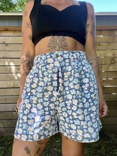 The cutest vintage 1990's floral shorts Faded coloring but still awesome  Side pockets  Zipper button fly  Great vintage condition minus the fading  Tag reads size 14  Measurements taken flat are  Waist: 15.5 in  Hips: 18 in  Rise: 14 in  Length: 18 in long  All sales are final  Thanks for checking out Cereal Vintage Thrift  Recycle Reuse Recreate  Recycle Reuse Recreate Spring High-waisted Jean Shorts With Elastic Waistband, Summer Floral Print Cotton Pajama Shorts, Summer Cotton Pajama Shorts With Floral Print, Summer Floral Print Relaxed Fit Pajama Shorts, Spring High-waisted Pajama Shorts, Spring Retro Jean Shorts, Retro Jean Shorts For Spring, Spring High-waisted Pajama Shorts With Pockets, Vintage High-waisted Jean Shorts For Spring