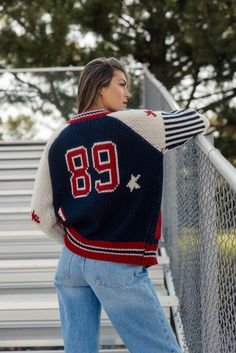 This sporty retro cardigan features a zip front + a letterman design. Perfect for those of us going back to school this year! A chunky knit and oversized fit give this cardi a cool girl look that you'll love this fall! ribbed hemlines patch pockets // paired with the wilder ribbed tank, trey mid rise skater jeans, + vans coming soon! Athleisure Mom, Retro Cardigan, Retro Cardigans, Clogs Heels, Mom Accessories, Skater Jeans, Nursing Friendly, Skirt Jumpsuit, Capri Blue