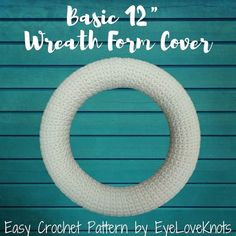 a white knitted wreath with the words basic 12'width form cover on it