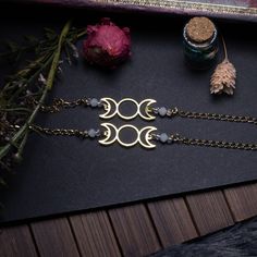 ☽STORY☾ Name: ✮goodness moon✮ the three phases of the moon, the goddess, divination. An ancestral symbol of witchcraft and divination, it's up to you to test it. ☽DESCRIPTION☾ *Czech glass beads *stainless steel chain * triple moon in brass ☽TIPS FOR USE☾ Over time, brass oxidizes. You can restore shine to your jewelry by rubbing it with a dry cloth. To preserve it as best as possible, avoid contact with sea or swimming pool water, perfume and store it away from humidity and the sun. I also recommend taking them off to sleep. ☽DIMENSIONS☾ Guaranteed lead-free, nickel-free, cadmium-free total length 16cm + 5cm extension chain. ☽DELIVERY☾ ✩Delivery costs are included for mainland France. Available from 35 euros for abroad ✩Sending by letter followed for France and abroad for orders of less t Swimming Pool Water, Water Perfume, Moon Bracelet, Phases Of The Moon, Triple Moon, Pool Water, The Goddess, Czech Glass Beads, Steel Chain