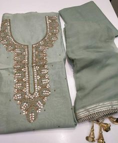 Item Overview Atharva Hand Embroidered Salwar Kameez w/beautiful Embroidered Neck Pista Green & elegant Sadowski work Chiffon Chinnon Dupatta. Dno -CH1203 Fabric: * Shirt Chanderi Silk - Green Pista - 2.5 Mts, * Dupatta: Chiffon Chinon Dupatta Green (Pista) w/ Gota Sadowski Work Dupatta. 2.5 Mts * Bottom Santoon Silk 2.5 Mts. Excusive Hand Embroidered Party Wear Punjabi Suit. Customization: * Fabrics: Designs Can be made in different Fabrics. * Stitching Available Care: * Dry Clean/ Avoid direct Elegant Pista Green Silk Churidar, Elegant Designer Pista Green Churidar, Elegant Pista Green Churidar With Resham Embroidery, Elegant Pista Green Chanderi Churidar, Elegant Pista Green Churidar With Straight Kurta, Elegant Pista Green Churidar For Festive Occasions, Elegant Pista Green Sets With Mirror Work, Unstitched Pista Green Kurta With Mirror Work, Elegant Pista Green Chanderi Lawn Suit