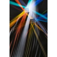 an abstract photograph with light streaks and colors