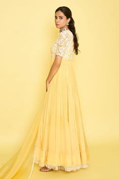 Canary yellow half sleeves anarkali with 3D petal embroidery on the bodice and a gathered pleated flare detailing. Paired with a vine lace embroidered border dupatta. - Aza Fashions Yellow Floor-length Anarkali Set With Chikankari Embroidery, Yellow Anarkali Set With Chikankari Embroidery, Floor-length, Designer Yellow Georgette Gown, Yellow Anarkali Set With Chikankari Embroidery For Reception, Yellow Georgette Gown For Diwali, Yellow Floor-length Dress With Sheer Dupatta, Yellow Georgette Anarkali Set Maxi Length, Yellow Floor-length Georgette Anarkali Set, Yellow Georgette Gown For Eid