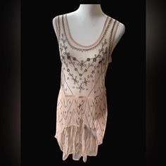 Here Is A Beautiful, Very Sheer, Pale Pink, Mini Dress Or Top. I Never Wore It. In The End, The Color Just Didn’t Suit Me. Would Be Adorable Over A Black Or Nude Bodysuit Or Slip, I’m Sure You Can Think Of Cute Ways To Wear It. Never Worn. With Tags. Size Small. The Beads Are Really Glittery, Wish I Could Show Them Off Better. They Sparkle Like Crazy! Spring Festival Mini Dress With Sequins, Spring Mini Dress With Beaded Straps And Fitted Cut, Summer Mini Flapper Dress With Sequins, Spring Mini Flapper Dress With Sequins, Fitted Mini Flapper Dress For Summer, Chic Fitted Flapper Dress For Summer, Fitted Mini Length Flapper Dress For Summer, Spring Flapper Dress With Sequins For Night Out, Glamorous Sleeveless Summer Flapper Dress