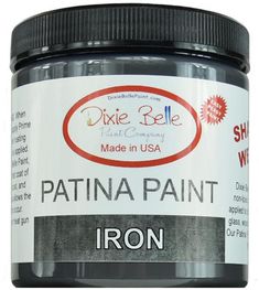 a jar of paint that is black and white with the words, dixie bell made in usa