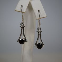 Sterling Silver (.925) French Wire Dangle Earrings With Bezel Set Genuine 6mm Round Faceted Onyx. Black Hallmarked Drop Earrings, Silver Onyx Drop Earrings, Classic Onyx Earrings Gift, Polished Onyx Earrings For Gift, Black Sterling Silver Earrings For Formal Occasions, Silver Onyx Earrings For Formal Occasions, Elegant Onyx Dangle Jewelry, Classic Black Dangle Jewelry, Classic Onyx Dangle Jewelry