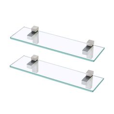 two glass shelves with metal brackets on them