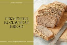 sliced loaf of fermented buckwheat bread on cutting board with knife