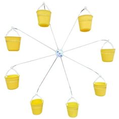 six yellow buckets hanging from a wire with four hooks on each side and one holding two empty buckets in the middle