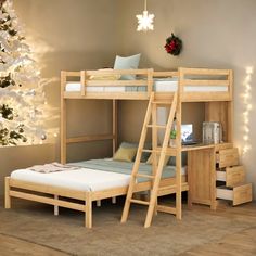 a wooden bunk bed sitting in a bedroom next to a christmas tree with lights on it