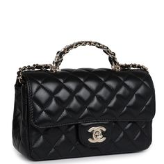 This Mini Rectangular flap bag is in black lambskin with light gold tone hardware and has a front flap with signature CC turnlock closure, rear half moon pocket, a faux crystal and black leather top handle and single interwoven black leather and light gold tone chain link shoulder/crossbody strap.The interior is lined in black leather and features a zipper pocket with Chanel pull and an open pocket below.Collection: 23A (RFID Chip)Origin: ItalyCondition: New and never worn (plastic on hardware)Accompanied by: Chanel box, Chanel dustbag, carebook, felt, RFID, retail UPC and ribbonMeasurements: 8" width x 5" height x 3" depth; 1.5" top handle, 20" strap drop Chanel Mini Rectangular, Chanel Mini Flap Bag, Crystal Top, Chanel Box, Black Leather Top, Chanel Mini, Bottega Veneta Shoulder Bag, Bags Designer Fashion, Fendi Bags