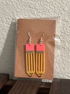 3D printed earrings shaped like pencils. Super adorable and a great gift for new students or teachers! Model was created and shared by user jdicerchio on Maker World. Material is PLA plastic. Pencil Earrings, 3d Printed Earrings, Printed Earrings, Wedding Jewelry Earrings, New Students, Wedding Earrings, 3d Printed, Crayon, Wedding Jewelry