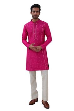 Hot pink full sleeves kurta with floral mirror jaal embroidery. Paired with an ivory pant. - Aza Fashions Chanderi Bandhgala With Mirror Work And Long Sleeves, Long Sleeve Chanderi Bandhgala With Mirror Work, Navratri Long Sleeve Sherwani With Gota Work, Navratri Long Sleeve Sherwani With Mirror Work, Long Sleeve Sherwani With Mirror Work For Navratri, Navratri Sherwani With Gota Work And Long Sleeves, Festival Long Sleeve Sherwani With Gota Work, Long Sleeve Traditional Wear With Mirror Work For Diwali, Diwali Long Sleeve Traditional Wear With Mirror Work