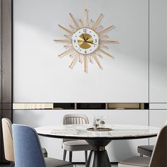 a dining room table with chairs and a clock on the wall